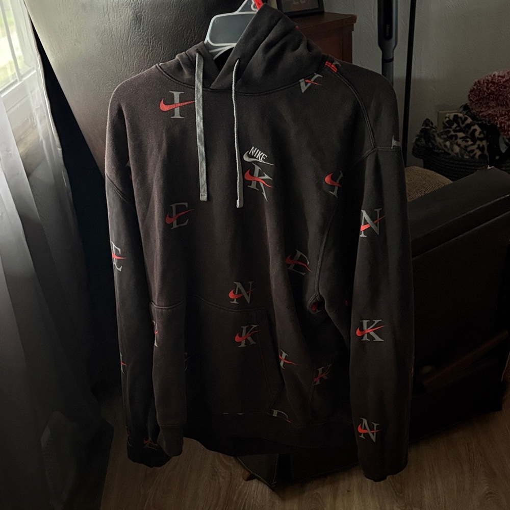 Nike Black Hoodie with Red and White Logo Accents
